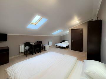 Четырехместный номер в Гостинице Тройка