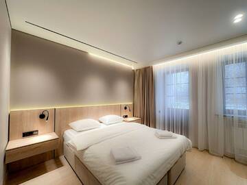 Номер делюкс с 1 двуспальной кроватью в Гостинице Тройка