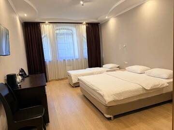 Четырехместный номер в Гостинице Тройка